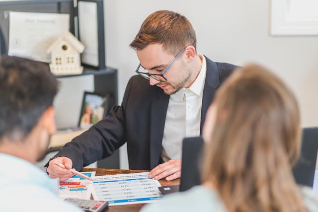a%20property%20manager%20speaking%20with%20two%20investors a%20property%20manager%20speaking%20with%20two%20investors